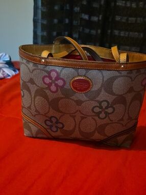 Coach Canvas Tote with Brown Body and Pink Floral Accents